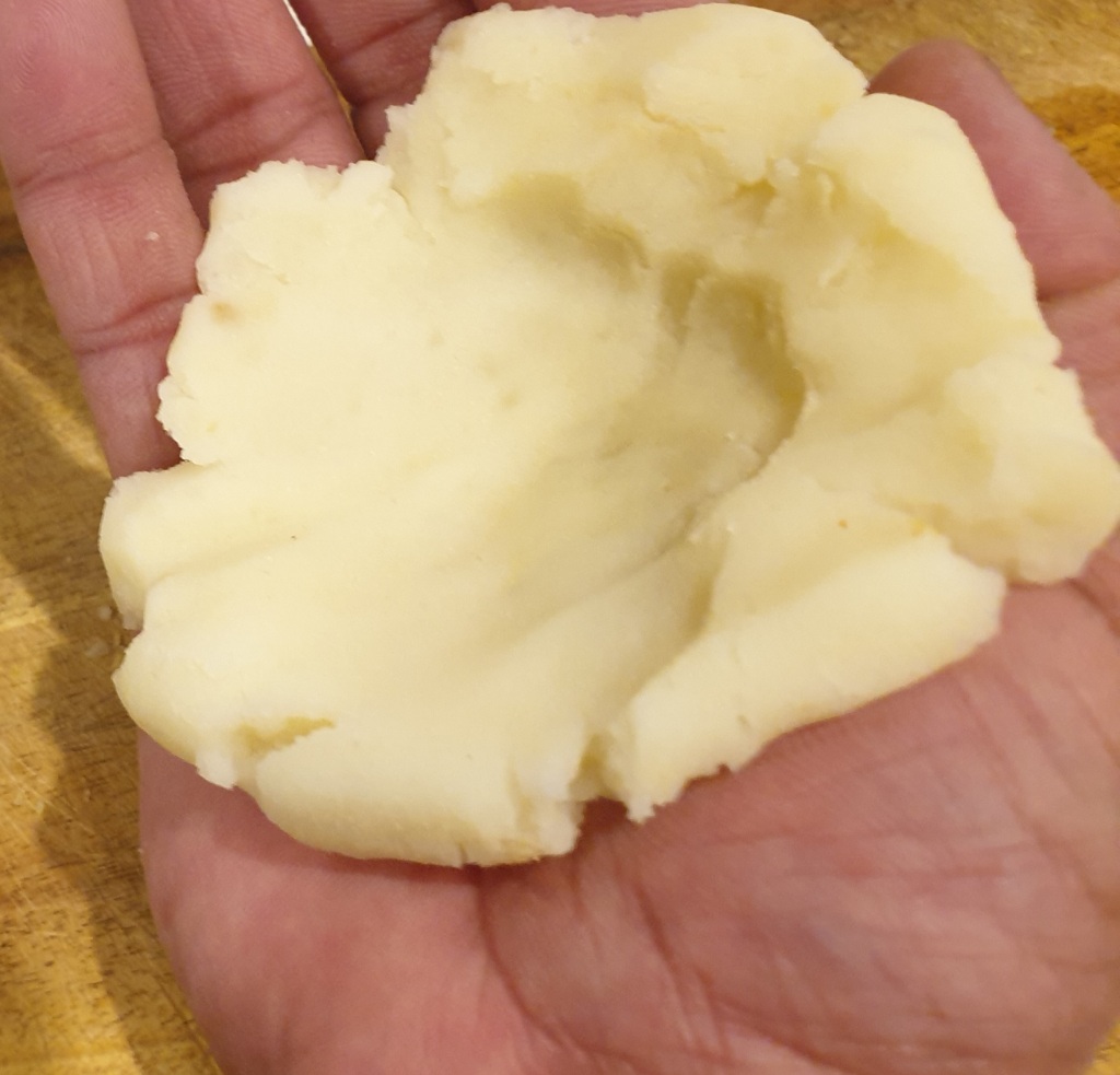 Mash potato flattened in your palm